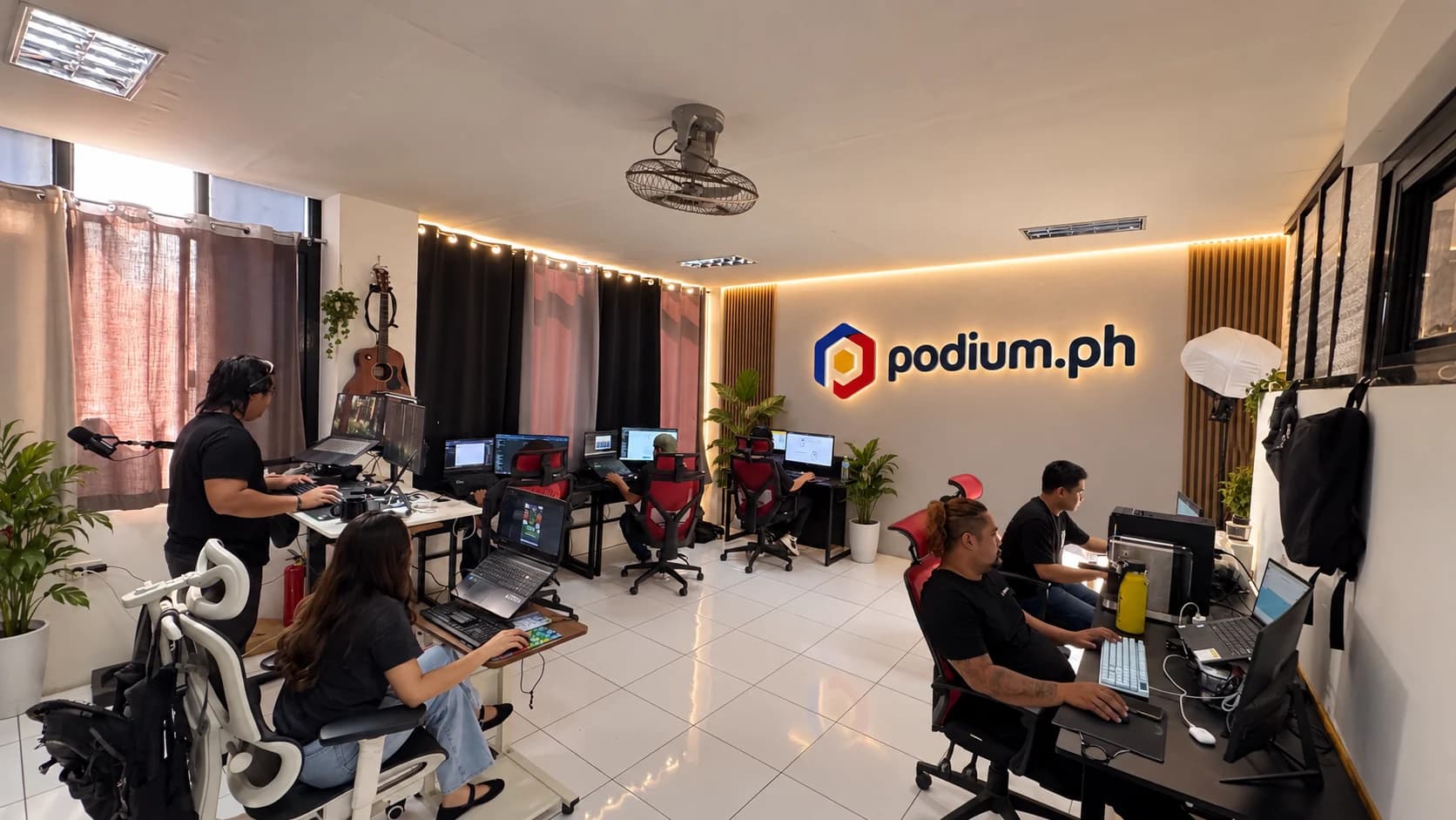 The Podium team at work in our Maasin City office